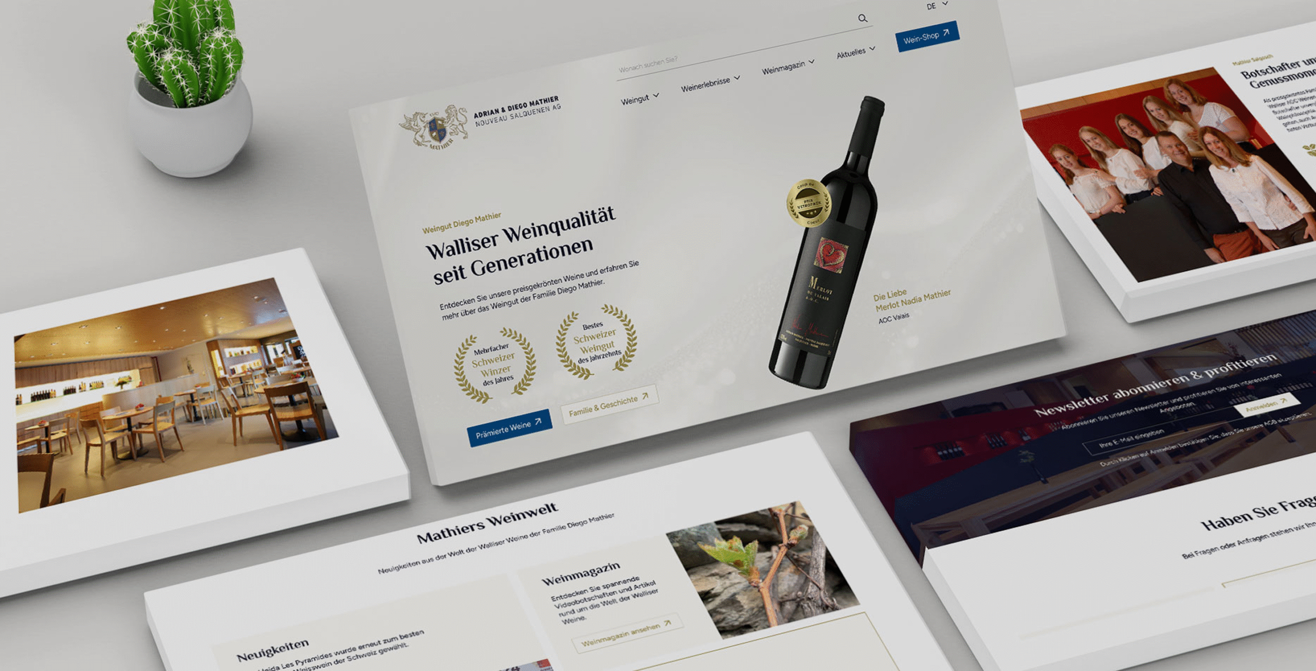 Ein digitales Display zeigt mehrere Website-Mockups, darunter eine Hauptseite mit einer Weinflasche, Auszeichnungen und mehrere kleinere Vorschaubilder mit verwandten Inhalten.